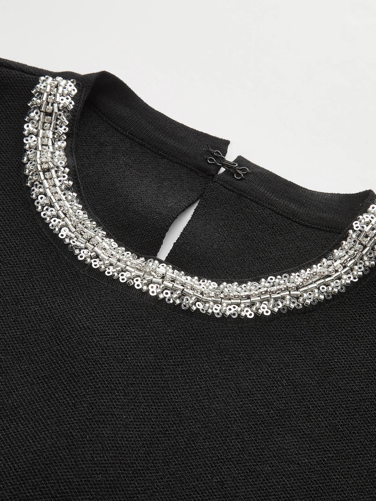 Sleeveless Flared Dress with Sequin Embellishments